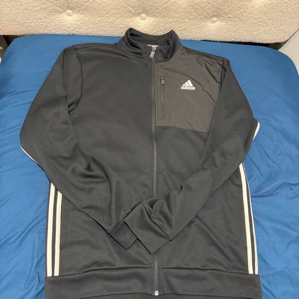 Adidas black track jacket with white stripes on sleeves, size L